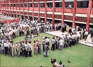 City residents line up for filing income tax returns at DAV College, Sector 10, Chandigarh, on Tuesday