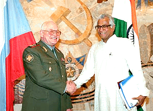 Russian Defence Minister Igor Sergeyev and his Indian counterpart George Fernandes shake hands prior to talks in Moscow on Tuesday. The talks were to focus on Indias plan to purchase 100 T-90 tanks, an aircraft-carrying cruiser and a production license for the Su-30 MKI fighter jet