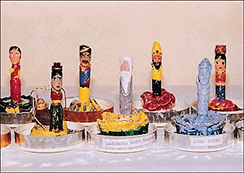 Statues carved out of writing chalk made by children on display at Pracheen Kala Kendra.