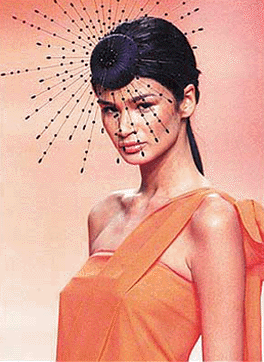 A Brazilian model presents Spring/Summer 2001 collection for Walter Rodrigues during a fashion show in Sao Paulo on Monday