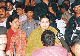 AIADMK leader Jayalalitha and her side Sasikala emerging from the special court premises in Chennai on Monday after a court framed charges against the former in the coal import case and another court completed questioning both of them in the Tansi land case