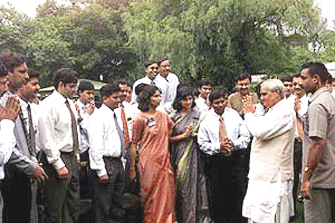 Prime Minister Atal Behari Vajpayee with a batch of IAS probationers at his residence in New Delhi on Saturday