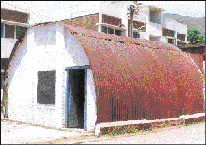 One of the round structures, nicknamed "dhols", that were built at Kalka for the labour working on the Kalka-Shimla railway line. Today they form part of a government school