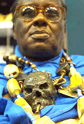 Well known South African traditional healer Baba Credo Mutwa, wears healing object around his neck while attending the XIII International AIDS Conference in Durban, South Africa on Monday