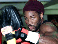 Britain's World Heavyweight Boxing Champion Lennox Lewis, at his training camp in north London Monday. Lewis will defend his title against Francois Botha of South Africa on Saturday