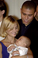 Brazilian soccer star Ronaldo, right, appears with wife Milene Domingues and son Ronald at the National Museum of Fine Arts in Rio de Janeiro, Brazil, Tuesday on Wednesday