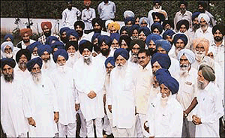 Mr Ujagar Singh Wadali, President of the Ropar district unit of the SHSAD, and his supporters with the Punjab Finance Minister, Capt Kanwaljit Singh, after they joined the SAD in Chandigarh on Wednesday. 