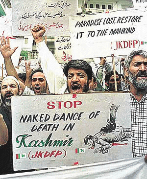 Senior separatist leader Shabir Shah along with his supporters holds a demonstration in Srinagar on Thursday