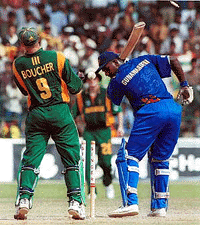 Sri Lankan batsman Avishka Gunawardene (right) looks back to see a delivery from South African bowler Paul Adams   which removes his stumps