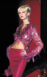 A model presents an outfit by Libanese designerZuhair Murad as part of his 2000-2001 Haute Couture fashion show on Sunday