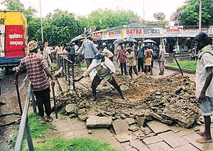 The bus queue shelter in Sector 18, Chandigarh, that collapsed in the rain on Monday, causing injuries to two persons. � A Tribune photograph 