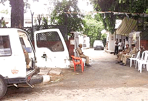 Police personnel guarding the Nationalist Congress Party (NCP) office in New Delhi on Monday after it was allegedly attacked by Shiv Sena activists on Sunday night