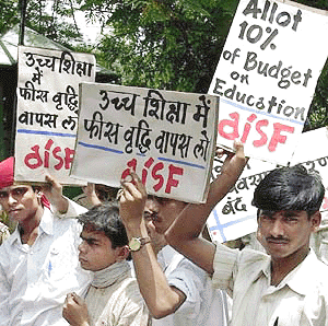 Students display placards during a demonstration in front of Human Resource Development Minister Murli Manohar Joshi�s residence in New Delhi on Thursday. Scores of students demonstrated against the fee hike in higher education