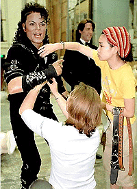   HONG KONG : Two artisans put finishing touches on a wax figure of Michael Jackson, in Hong Kong, Wednesday, July 19, 2000. Final preparations are under way for the August opening of Madame Tussaud's Wax Museum in Hong Kong. AP/PTI