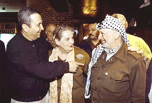 Israeli Prime Minister Ehud Barak (left), Secretary of State Madeleine Albright and Palestinian leader Yassar Arafat enjoy a moment at Camp David on Friday