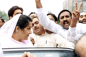 Begum Kulsoom Nawaz ( left ), wife of deposed Prime Minister Nawaz Sharif, comes out of the 16th century Attock Fort, northwest of Islamabad on Saturday