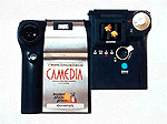 The newly released C-211 Zoom camera, developed jointly by Olympus and Polaroid, and formally introduced on Tuesday in Irvine, Calif, is shown in this undated handout photo. The C-211 Zoom offers filmless digital camera capture with a built-in photo printer. � AP