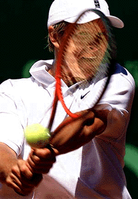 Yevgeny Kafelnikov of Russia returns a backhand to Hernan Gumy of Argentina during their match at the Austrian Tennis Open in Kitzbuehel July 27, 2000. Kafelnikov won the match 6-4 2-6 6-2.