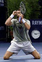 Justin Gimelstob from Livingston, N.J., reacts after upsetting Mark Philippoussis of Australia, 3-6, 7-6(7-5), 7-6(7-3), during the second round of Mercedes-Benz Cup on Thursday in Los Angeles. � AP/PTI