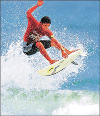 Brazilian Marcelo Nunes performs an aerial surfing manoeuvre to advance to the round of 64 surfers in the US Open of Surfing at Huntington Beach in California on Thursday. Nunes advanced alongside compatriot Tanio Barreto and the pair will now face Hawaiian Kalani Robb and South African Paul Canning in their next heat. �Reuters