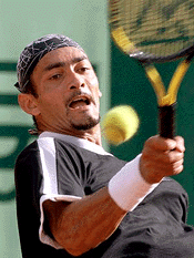 Emilio Alvarez of Spain returns a forehand to his compatriot Francisco Clavet during their semi-finals match at the Austrian Tennis Open in Kitzbuehel on Saturday. Alvarez won the match 6-3 7-5 and proceeds to the final
