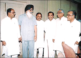 Punjab Chief Minister Parkash Singh Badal and Madhya Pradesh Chief Minister Digvijay Singh with Defence Minister George Fernandes at a meeting of the Standing Sub-Committee of the Inter-State Council at Vigyan Bhavan in New Delhi on Tuesday