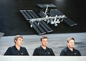 The first crew of the International Space Station, Cosmonauts, Sergei Krikalev, left, Yuri Gidzenko, center, and Astronaut William Shepherd, answer questions during a press conference at Johnson Space Center on Wednesday. This is their last U.S. press conference before leaving for Kazakhstan for further training and then launch later this year