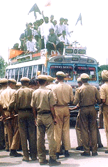 Indian security personnel enforcing a curfew prevent protesting Hindus from proceeding around the city 03 August 2000, after several attacks by separatist militants left over 95 people dead. There were nation-wide protests over the massacres which were condemned by both India and Pakistan