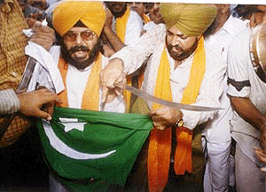 Activists of National Akali Dal demonstrating against the massacre in valley, at Pakistan High Commission in New Delhi on Thursday