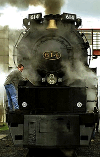 Eric Hessler from Royersford, Pa. starts the air pumps as he helps prepare a 1948 Chesapeake & Ohio No. 614 steam locomotive for auction in Kearny, N.J.  The high bid of $200,000 was rejected at the auction because it fell far short of the projected $1 million to $3 million. If a suitable deal can't be struck at a future auction, the locomotive may be donated to a rail museum. � AP/PTI photo