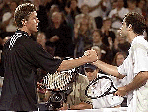 American Pete Sampras, right, congratulates Marat Safin of Russia at centre court after losing 6-4, 3-6, 7-6 (8) in the quarter-finals at the Canadian Masters Tennis tournament in Toronto, on Friday. � AP/PTI photo