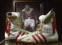 Muhammad Ali's boxing shoes from the first Ali-Frazer fight in March 8, 1971, sit on display at Butterfield's & Butterfield's, an ebay company, on Friday, in Los Angeles to be auctioned on August 12 at Dodger Stadium. Starting bid is expected to be between $1,00,000 and $1,50,000. �