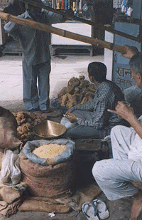 A jaggery seller makes a deal in Gur Mandi, Ludhiana