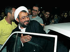 ranian pro-reform cleric Hassan Youssefi Eshkavari arrives at Tehran's Mehr-Abad airport late on Friday.