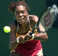 Venus Williams reaches for a backhand shot during her finals match against Monica Seles at the Acura Classic on Sunday 
