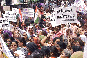 Workers of Mahila Congress at a rally in New Delhi on Tuesday