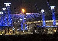 The Olympic cauldron lights up the sky over the Olympic Stadium at Sydney's Homebush Bay in the early hours of Wedmesdau during a test run for next month's opening ceremony. The 8 meter-high cauldron will be lit on September 15 during the official opening ceremony for the 2000 Sydney Olympics.