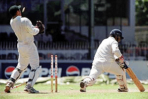 Sri Lankan batsman Arjuna Ranatunge, (right) is bowled by South African spinner Nicky Boje, not in the picture, on the third day of the third and final cricket test match between the two countries in Colombo, Sri Lanka, on Tuesday