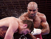 Evander Holyfield, background, connects with John Ruiz during their WBA Heavyweight title, on Saturday night, in Las Vegas