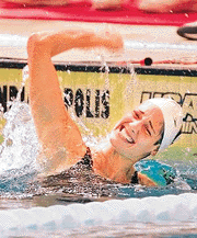 Kristy Kowal celebrates her U.S. record in the women's 200 metres breaststroke at the U.S. Olympic Swim Trials in Indianapolis on Monday