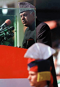 Chief Minister of Jammu and Kashmir Farooq Abdullah addresses a gathering on the Indian Independence Day celebrations on Tuesday at Baksi Stadium in Srinagar.  Abdullah appealed to Kashmiri militants to enter a dialogue and said guns were no solution to the pea