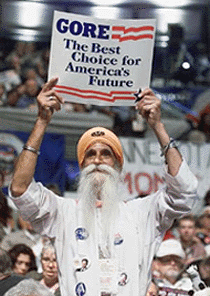 Mississippi delegate Balwant Singh cheers during the convention