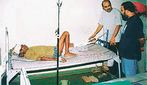 Ludhiana Deputy Commissioner S.K. Sandhu visits one of the injured admitted in the Civil Hospital in Ludhiana on Wednesday.