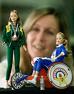 A Sydney woman looks at the latest Barbie dolls to hit the Olympic Store shelves on Wednesday. � Reuters photo