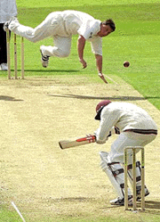 England pace bowler Darren Gough puts all his effort into this delivery to West Indies batsman Wavell Hinds during the first day of the Fourth Test at Headingley cricket ground, Leeds on Thursday