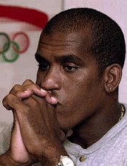 Spanish nationalized Cuban-born waterpolo player Ivan Perez answers questions during a press conference in Barcelona on Thursday  after Cuba refused to allow him to compete for Spain in the Sydney Olympics