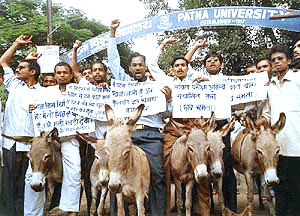Students of Patna University took out a rally with ass in support of the striking teachers and non-teaching staffs of different universities of Bihar state and blaming for paralising the study in colleges