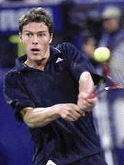 Marat Safin, of Russia, returns to Tim Henman, of Great Britian, in the semifinals of the RCA Championships in Indianapolis on Saturday. Safin advanced to the finals with a 7-5, 6-4 win.