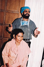 Dr Rajinder Singh, eye surgeon, with his patient Balwinder Kaur. He operated upon her eye for glaucoma using a new technique.� Photo by Inderjeet Verma