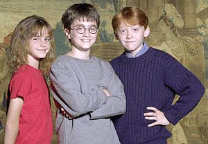Daniel Radcliffe (centre), who has been named as the young actor to play Harry Potter in the upcoming film adaptation of the popular books by J.K. Rowling, with newcomers Rupert Grint (right) and Emma Watson taking on the roles of Ron and Hermione, Harry�s best friends, Warner Bros. Pictures announced on Monday